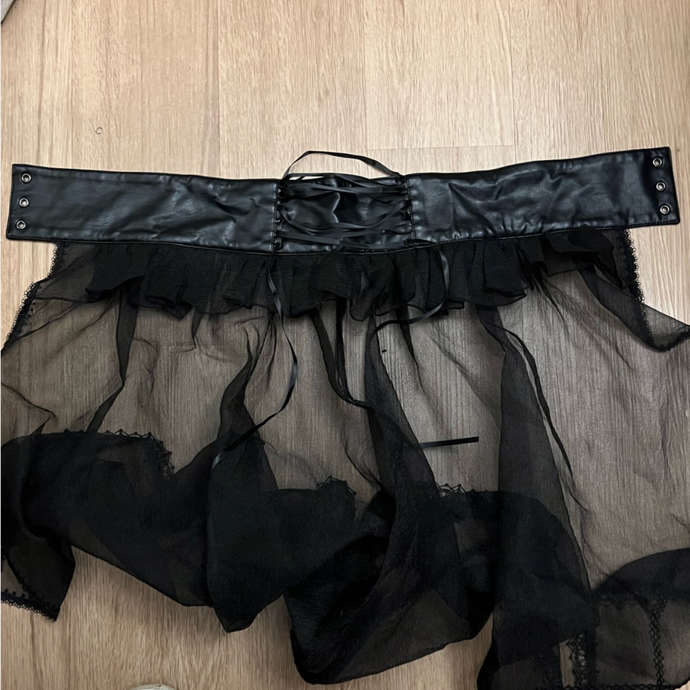 Chic stylish women’s skirt/corset, lace sheer.